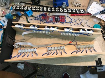 Euro-style terminal blocks between the ribbon cables and the solenoids – another opportunity to detach solenoids in future if I need to.