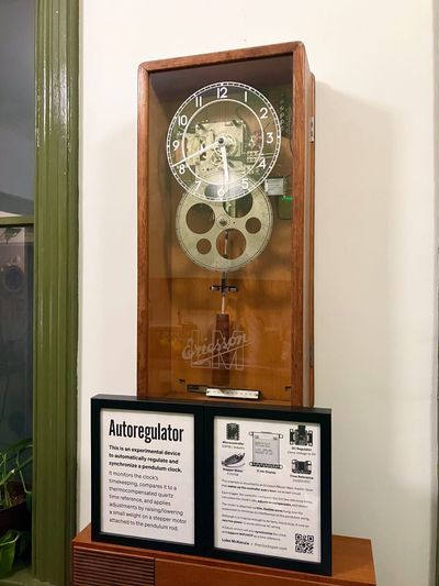 The finished Autoregulator installed on the pendulum, ready for display.